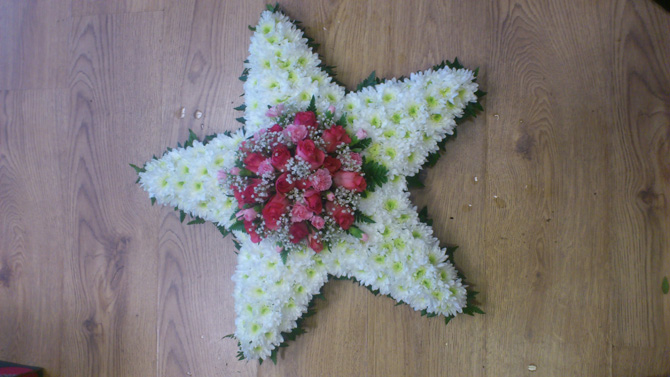 Star shaped funeral flowers white pink florist north Bristol FST2